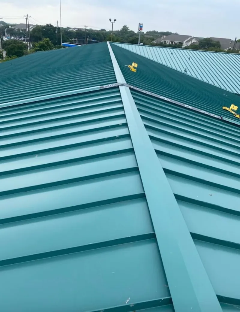 Green commercial metal roof ridge and valley for Metal Roof Repair in Carmel